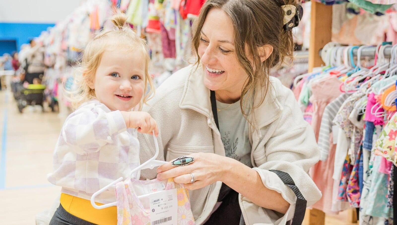 Kids grow fast shopper with kids at sale